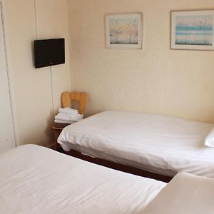Zimmer mit zwei Einzelbetten